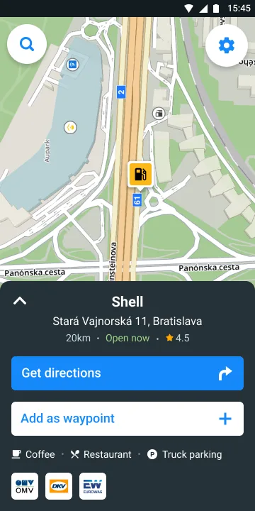 Road Lords place detail for a Shell fuel station, showing distance, opening state, rating, buttons to get directions or add it as a waypoint, and the amenities recorded for the stop including truck parking.